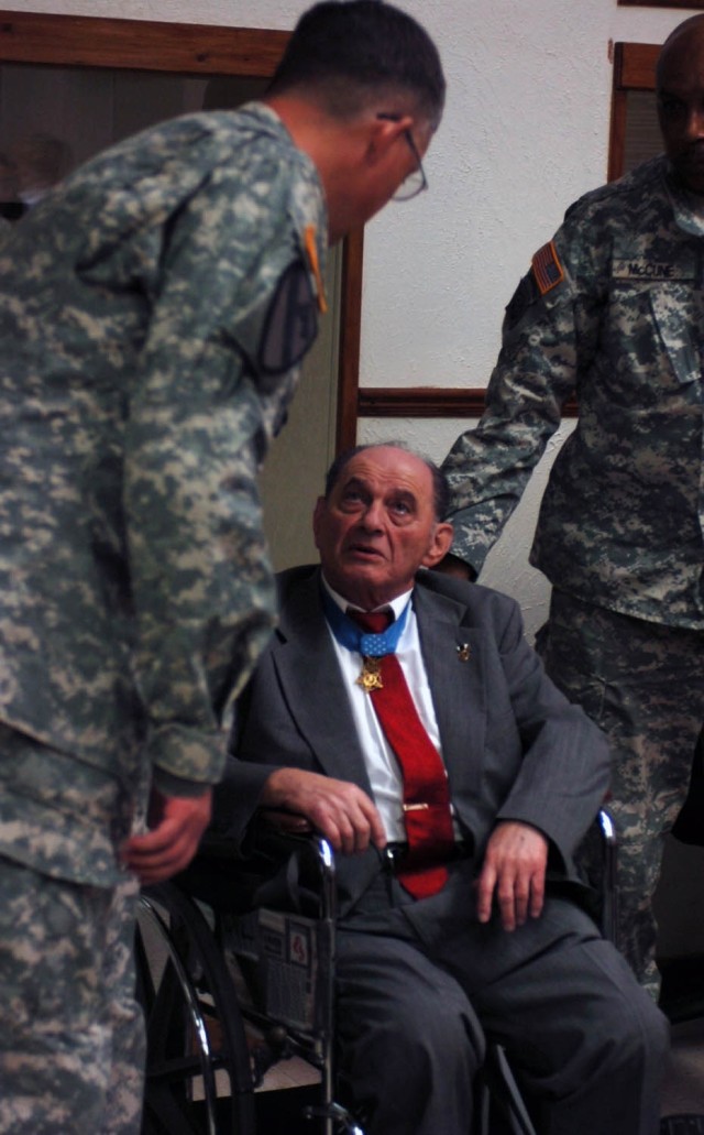 Medal of Honor recipient Tibor Rubin speaks with Lt. Col. Kevin Dunlop, commander of the 3rs Squadron, 8th Combined Arms Battalion, 3rd Brigade Combat Team, 1st Cavalry Division, after a ceremony dedicating the 3-8 conference room to Rubin March 3. R...