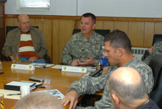 Col. Paul E. Funk II (center), commander, 1st Brigade Combat Team, 1st Cavalry Division talks to members of the Army Science Board in a meeting at Fort Hood, Texas Feb. 27 about some of his brigade's achievements while deployed to Operation Iraqi Fre...