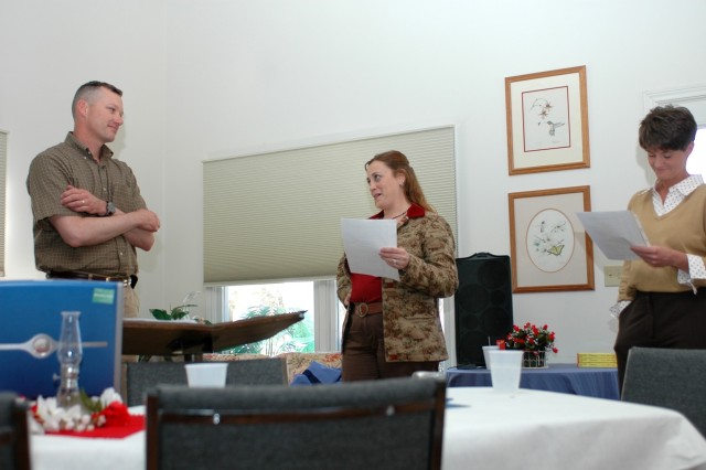 Carol Jessee (center) and her husband, Lt. Col. Tom Jessee, the executive officer for the 1st Air Cavalry Brigade, 1st Cavalry Division, act out a short skit during a senior leader Strong Bonds retreat Feb. 23. Lauri Causey, wife of Chaplain (Maj.) C...