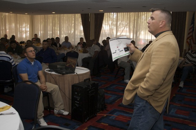 Lt. Col. Timothy Daugherty, 5th Battalion, 82nd Field Artillery Regiment commander, gives a presentation to Soldiers and their Family members during the battalion's pre-deployment offsite training in Austin. The 4th Brigade Combat Team, 1st Cavalry D...