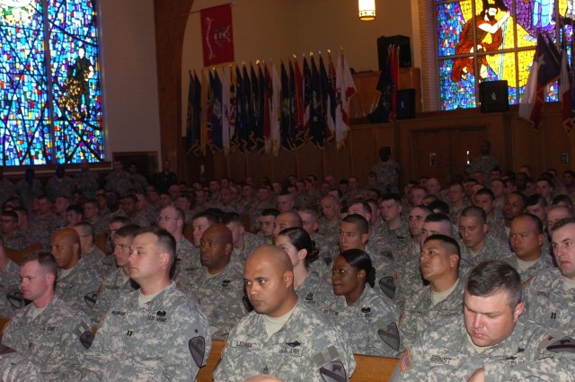 Soldiers from 1st Battalion, 5th Cavalry Regiment, 2nd Brigade Combat Team, 1st Cavalry Division attend the memorial service for Spc. Joshua Carrol at the 1st Cavalry Division Memorial Chapel on Fort Hood, Texas March 12. Carrol died as the result...