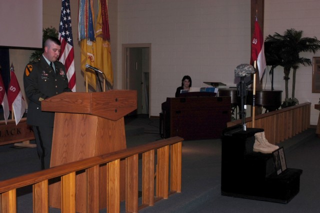 Cpt. Jason Dudley, the commander of Company C, 1st Battalion, 5th Cavalry Regiment, 2nd Brigade Combat Team, 1st Cavalry Division speaks during a memorial service honoring the life of Spc. Joshua Carrol March 12 at the 1st Cavalry Division...