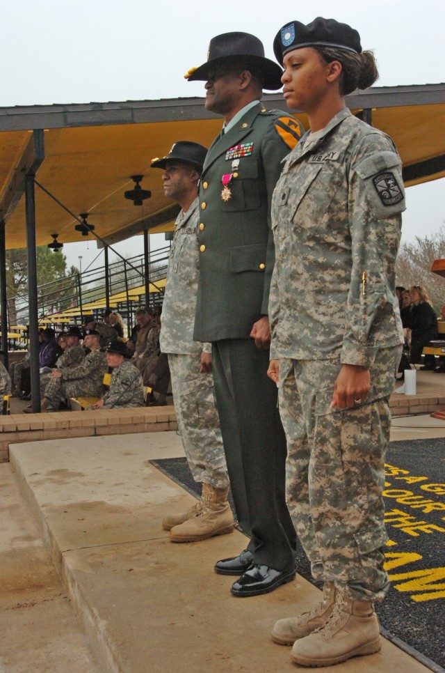 (From left to right) Col. Bryan Roberts, the commander of the First Team's 2nd Brigade Combat Team, retired Sgt. Maj. Larry Warren, the 1st Cavalry Division's former G6 top noncommissioned officer, and Cadet Crystal Warren with the 712th Military...