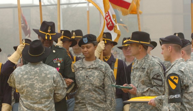 The 1st Cavalry Division's former G6 senior noncommissioned officer Sgt. Maj. Larry Warren is being recognized for 30 years of distinguished service in the Army during a ceremony held on Fort Hood, Texas's Cooper Field March 11. The Killeen, Texas...
