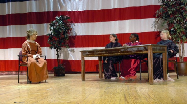 Students from Saegert Ranch Elementary School (Left to Right) Brittany Colon, Vivian Medina, Nadia Carter and Savannah Morelock put on a skit for an audience during a Women's History Month celebration held at Fort Hood's Houze Theater March 13....