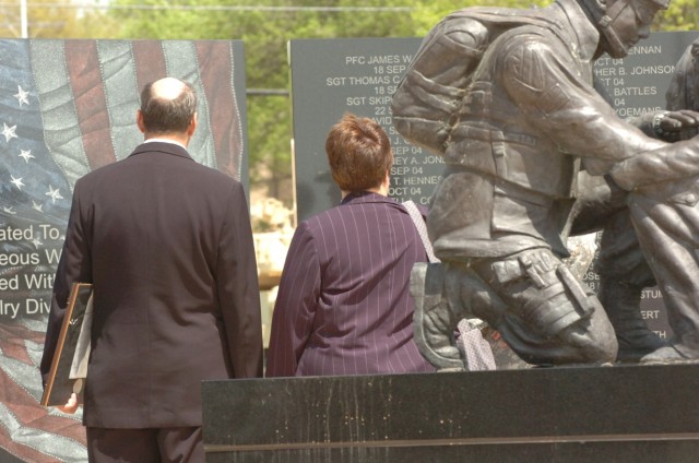Capt. Mark Resh's parents, Charlie and Carol Resh, stand at the 1st Cavalry Division's Operation Iraqi Freedom memorial where their son's name will be forever engraved after a Silver Star presentation ceremony held the division's parade field on...