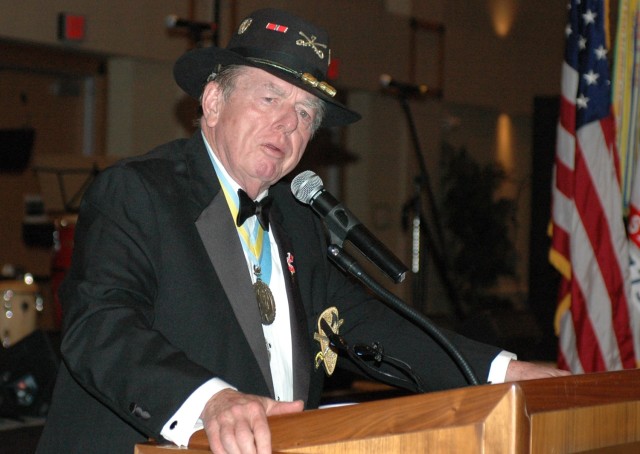 Joe Galloway, an author and journalist who served three tours in Vietnam, talks about his relationship with Soldiers and his experiences with the 1st Cavalry Division in Ia Drang Valley 43 years ago during the division's military ball at the...