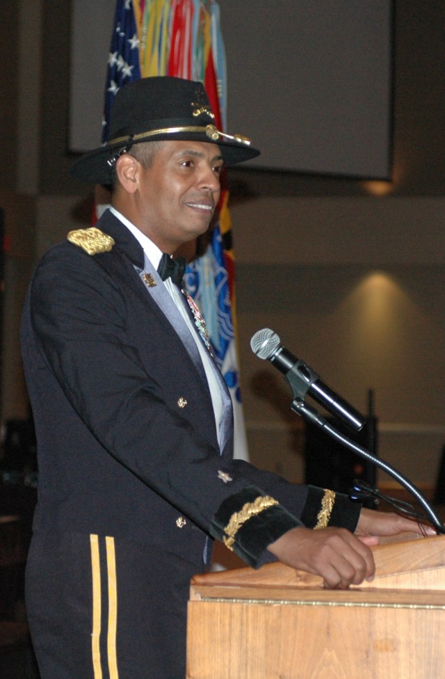 Brig. Gen. (P) Vincent K. Brooks, the commanding general of the 1st Cavalry Division from Alexandria, Va., introduces author and journalist, Joe Galloway, at the division's military ball at the Killeen Civic and Conference Center March 26. Brooks enc...