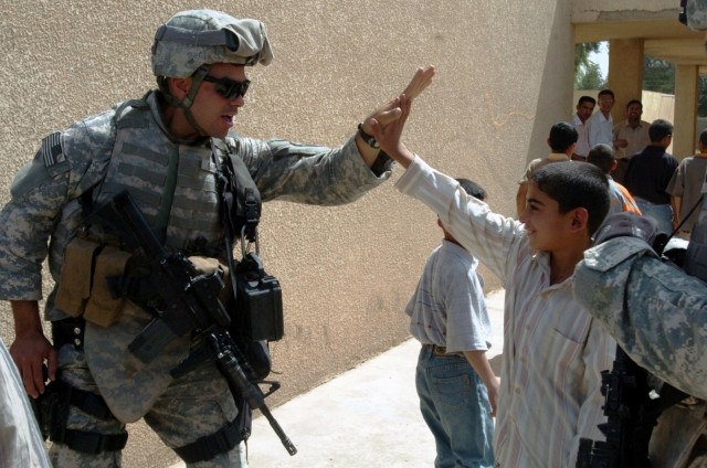 Soldiers Distribute School Supplies in Kalsu