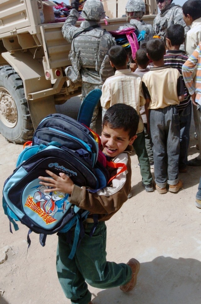 Soldiers Distribute School Supplies in Kalsu