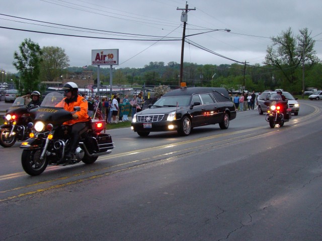 Crowds Pay Final Honors to Staff Sgt. Maupin.