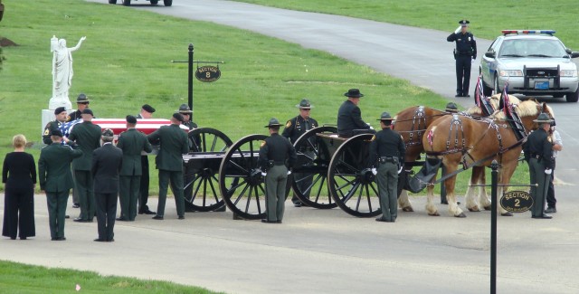 Staff Sgt. Keith &#039;Matt&#039; Maupin is carried to his final resting place.