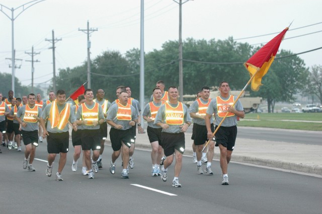 Col. Paul E. Funk II (third from right), the 1st Brigade Combat Team, 1st Cavalry Division commander and a native of Roundup, Mont., leads the "Ironhorse" Brigade, in a brigade run on April 22 at Fort Hood, Texas.  The run marked the last time Funk w...