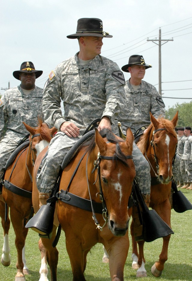 From left to right: Senior leadership from the 1st "Ironhorse" Brigade Combat Team, 1st Cavalry Division to include Command Sgt. Maj. Stanley D. Small, the brigade\'s outgoing command sergeant major; Col. Paul E. Funk II, the brigade's outgoing...
