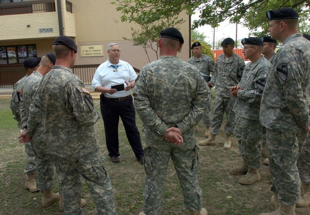 Medal of Honor recipient Charles Hagemeister talks to medics from his former unit, Headquarters and Headquarters Company, 1st Battalion, 5th Cavalry Regiment, 2nd Brigade Combat Team, 1st Cavalry Division, during his visit with the Black Jack troops ...