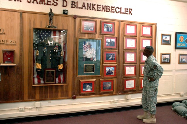 Bliss Garrison CSM views Blankenbeclr memorial wall