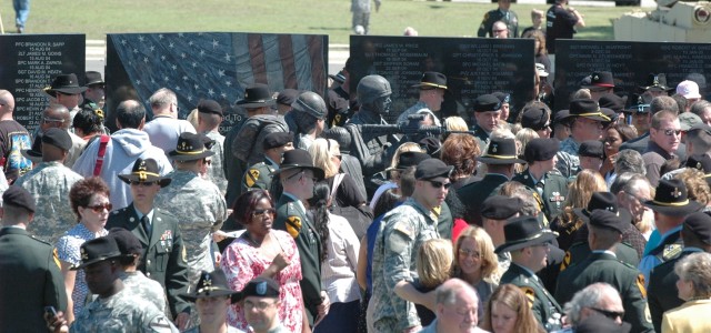 Gold Star families, friends and fellow warriors of 1st Cavalry Division gather in the division's Operation Iraqi Freedom memorial after a rededication ceremony held on Cooper Field May 16. In addition to the original 168 names, 493 were added to the ...