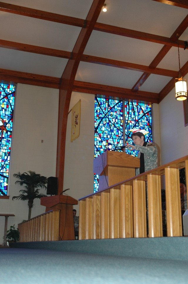 Chaplain (Lt. Col.) Barbara Sherer, incoming 1st Cavalry Division chaplain, speaks during a changing of the stole ceremony at the1st Cav. Div. memorial chapel May 20. Sherer is an ordained Presbyterian minister who has published numerous articles...