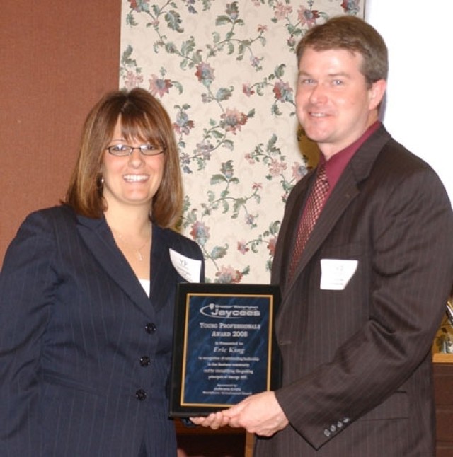 Civilian employee receives community award