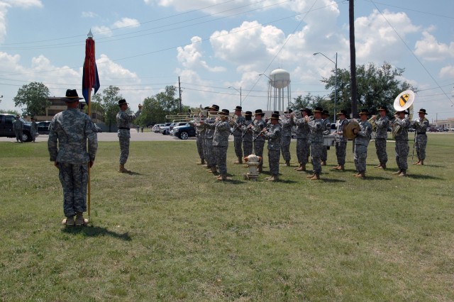 The 1st Cavalry Division band plays as guests begin taking their seats at a change of command ceremony held in front of the division's music hall May 29. During the ceremony, Chief Warrant Officer 4 Glen Nardin relinquished command to Chief...