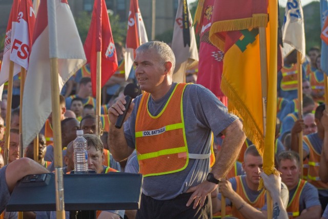 Col. Philip Battaglia, commander, 4th Brigade Combat Team,1st Cavalry Division speaks to his troops after the brigade run May 30 at Fort Hood, Texas. He reiterated that the unit is still set for a 15-month deployment to Iraq and that Soldiers and the...