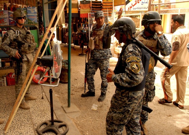 Combined Patrols Helping Iraqis Assume Baghdad Security