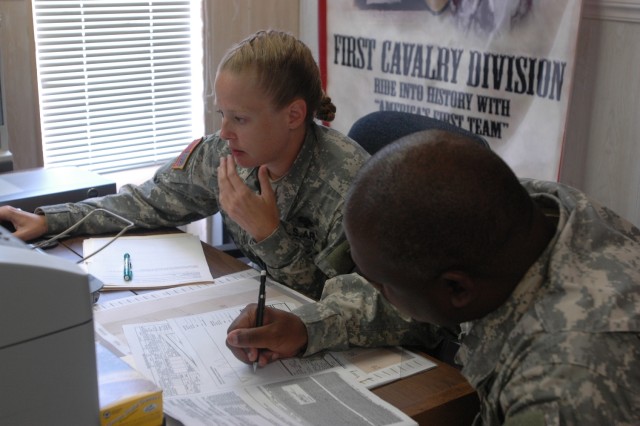 Staff Sgt. Rebecca Adams (left), a native of Fort Wayne, Ind. and a career counselor for the 1st Brigade Combat Team, 1st Cavalry Division, and Staff Sgt. Melvin Bright, a 1st Brigade Special Troops Battalion retention noncommissioned officer, who...