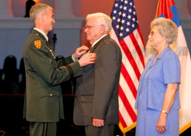 Cpl. Newton Duke received the Purple Heart on June 7 from LTG Kevin T. Campbell, SMDC/ARSTRAT commanding general. Duke is a veteran of the Korean War. He survived twenty-seven months as a Prisoner of War in North Korea from 1951-1953 and was...