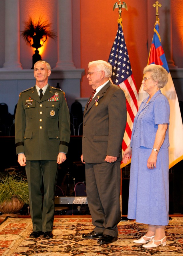 Cpl. Newton Duke received the Purple Heart on June 7 from LTG Kevin T. Campbell, SMDC/ARSTRAT commanding general. Duke is a veteran of the Korean War. He survived twenty-seven months as a Prisoner of War in North Korea from 1951-1953 and was...