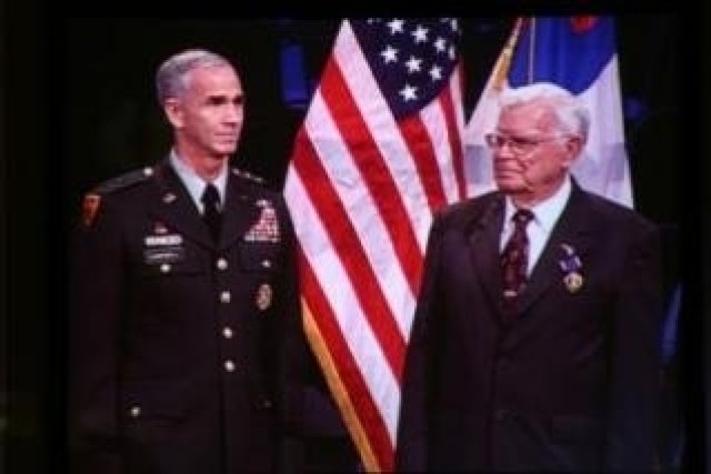 Cpl. Newton Duke received the Purple Heart on June 7 from LTG Kevin T. Campbell, SMDC/ARSTRAT commanding general. Duke is a veteran of the Korean War. He survived twenty-seven months as a Prisoner of War in North Korea from 1951-1953 and was...