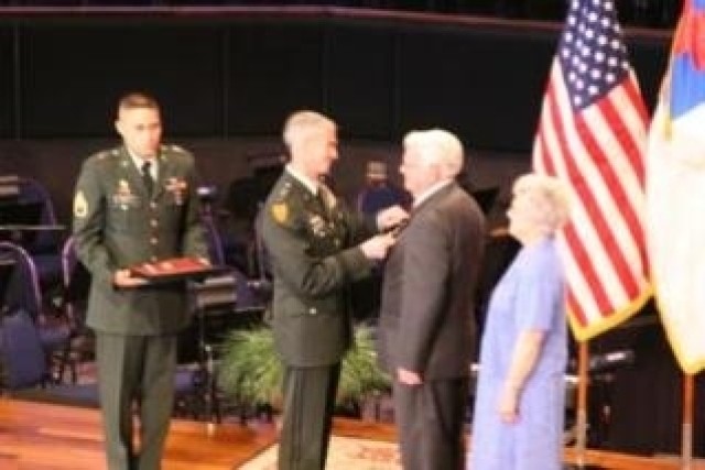 Cpl. Newton Duke received the Purple Heart on June 7 from LTG Kevin T. Campbell, SMDC/ARSTRAT commanding general. Duke is a veteran of the Korean War. He survived twenty-seven months as a Prisoner of War in North Korea from 1951-1953 and was...