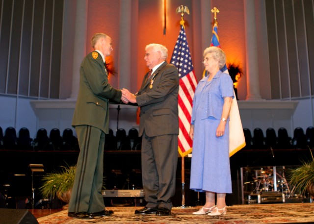 Cpl. Newton Duke received the Purple Heart on June 7 from LTG Kevin T. Campbell, SMDC/ARSTRAT commanding general. Duke is a veteran of the Korean War. He survived twenty-seven months as a Prisoner of War in North Korea from 1951-1953 and was...