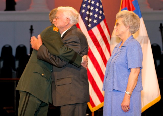 Cpl. Newton Duke received the Purple Heart on June 7 from LTG Kevin T. Campbell, SMDC/ARSTRAT commanding general. Duke is a veteran of the Korean War. He survived twenty-seven months as a Prisoner of War in North Korea from 1951-1953 and was...