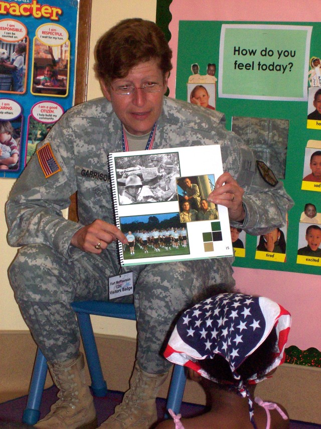 USAG Commander reads to CDC children for Army Birthday