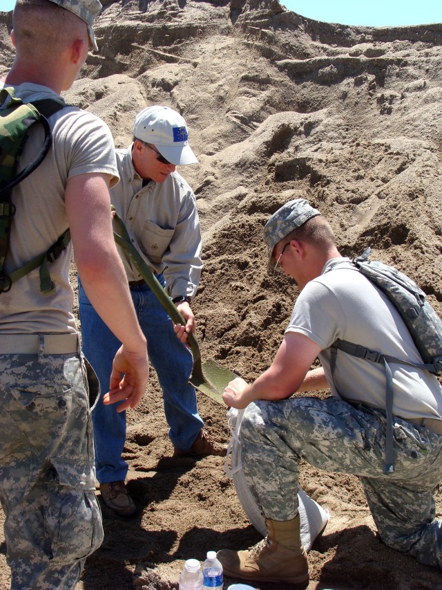 Governor Helps with Sandbags