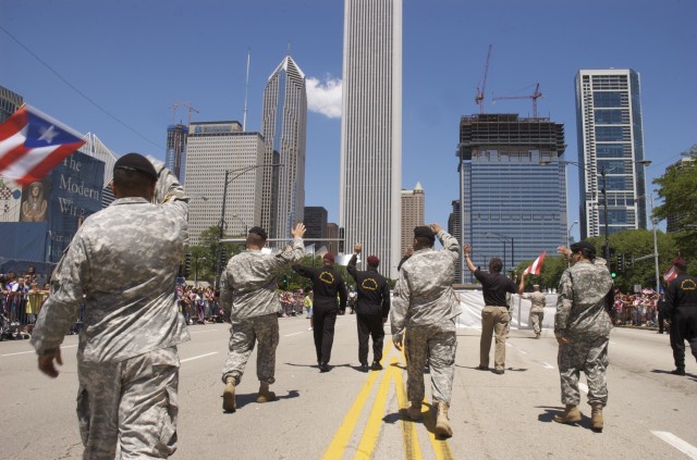 Soldiers march in the Puerto Rican Day Parade in Chicago