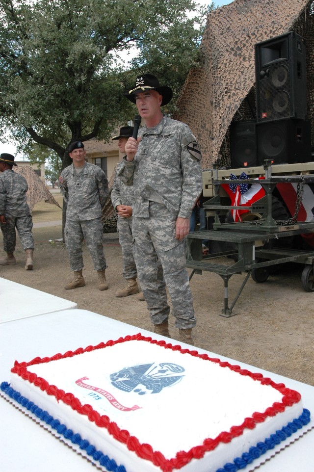 Major General Daniel Bolger (center), the commanding general for the 1st Cavalry Division, speaks to Soldiers from 615th Aviation Support "Cold Steel" Battalion, 1st Air Cavalry Brigade, 1st Cav. Div., and the 404th Brigade Support Battalion...