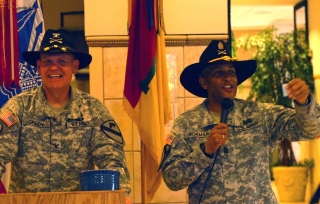 Sioux Falls, S.D. native Col. Tobin L. Green, brigade commander, and Command Sgt. Maj. James Norman, command sergeant major and native of Compton, Calif., both from the 1st "Ironhorse" Brigade Combat Team, 1st Cavalry Division, conducted a raffle...