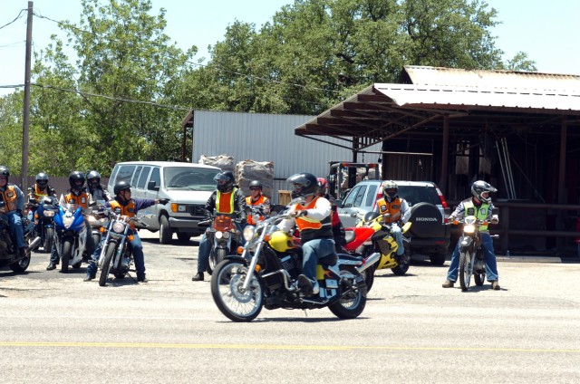 The group of Ironhorse motorcycle riders line up in preparation to ride back to Fort Hood, Texas after enjoying lunch in Llano, Texas during the Ironhorse Bike Stampede June 12.  The day was a bike mentorship ride that gave experienced riders the...