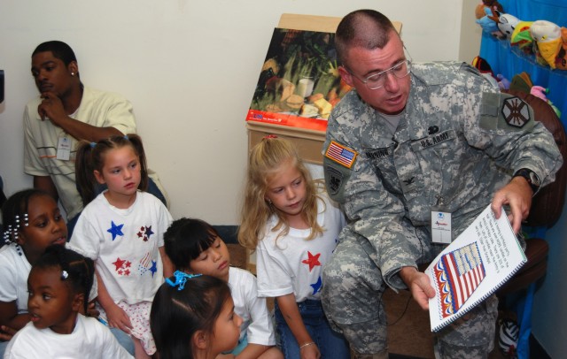 Bliss Commander reads to children