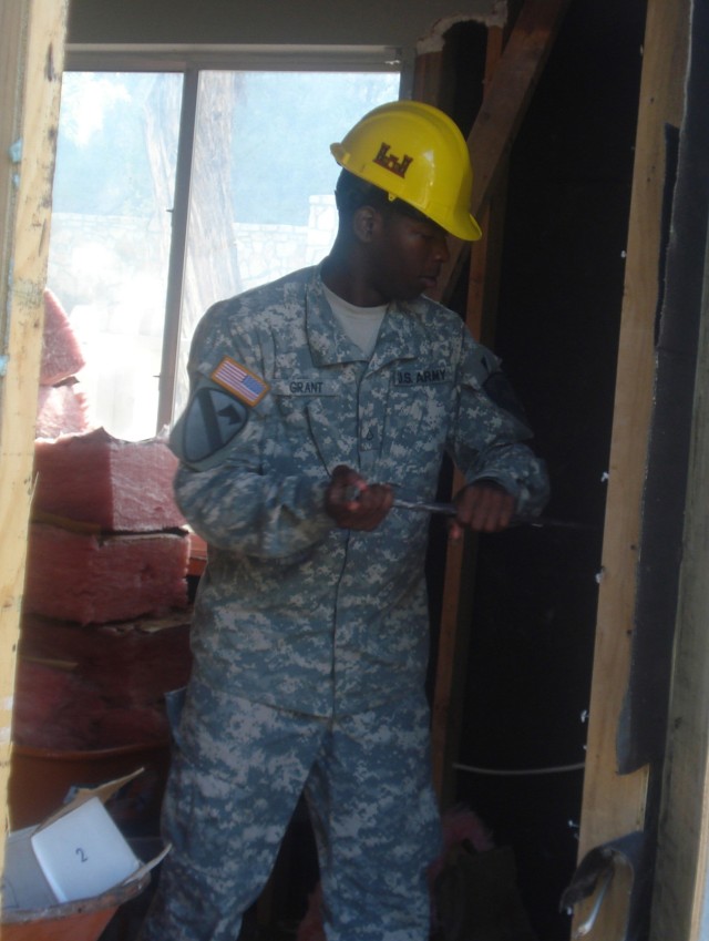 Boston, Mass. native Spc. David Durso, an engineer with Company E, 2nd Battalion, 5th Cavalry Regiment lends his hand and strength to the Habitat for Humanity organization in Austin, Texas June 17. Durso, along with others in this unit, went to...