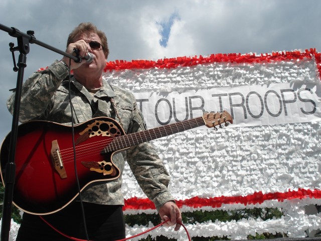 Joe Cantafio performs on a float during the Hinsdale 4th of July Parade