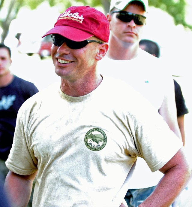 Capt. Ashton Read, commander of Battery A, 2nd Battalion, 82nd Field Artillery Regiment, 3rd Brigade Combat Team, 1st Cavalry Division from Westminster, Md., speaks with the Soldiers of his battery at the end of an eventful day at Belton Lake...