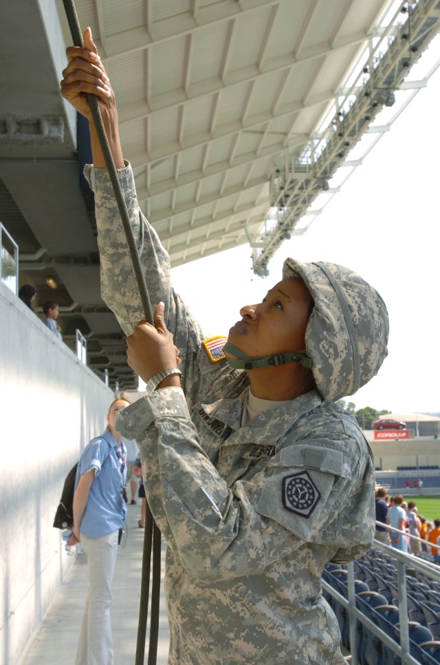 2LT Giwa-Layeni belays rappeller at Chicago Machine game