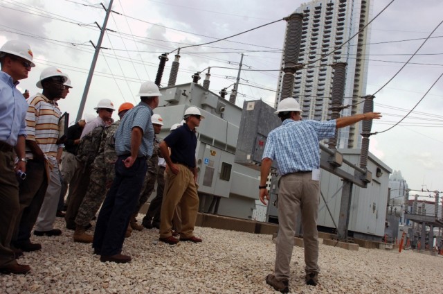 The engineering manager for the Seaholm power substation in Austin, Texas, Dan Smith, discusses what exactly happens in a substation like the one Soldiers from the 2nd Brigade Combat Team, 1st Cavalry Division, were getting a tour of during the city ...