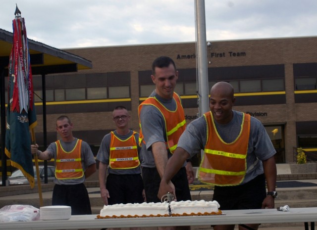 Chapel Hill, N.C. native, 1DSTB Commander, Lt. Col. Matthew Karres (left) and New Orleans, La. native Command Sgt. Maj. Clinton Lee Joseph Jr. make the first cut to the Division Special Troops Battalion, 1st Cavalry Division's birthday cake during a ...