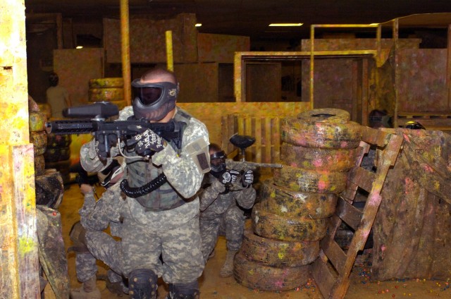 Members of the "Lethal Threat' Paintball Team perform a squad based movement in attempt to corner their enemy. By engaging the enemy, and placing covering fire in the enemy's direction, one member can then move to a closer position to lay down cover ...
