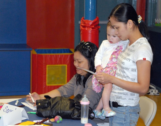 Volunteers train in proper child care