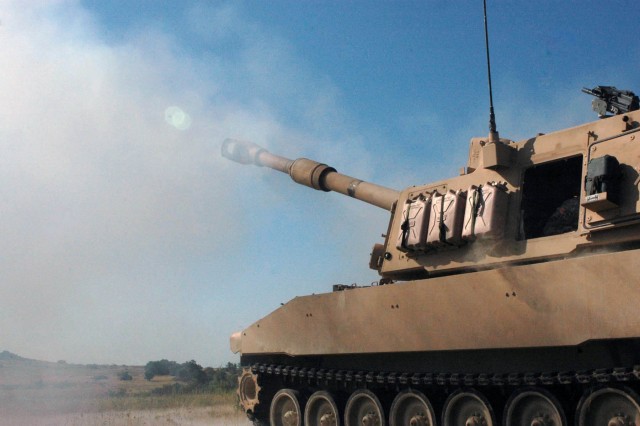 A M109A6 155mm Paladin system recoils shortly after a live fire mission on Fort Hood, Texas. Battery A, 2nd Battalion, 82nd Field Artillery Regiment, 3rd Brigade Combat Team, 1st Cavalry Division provides indirect fire support for combat patrols...