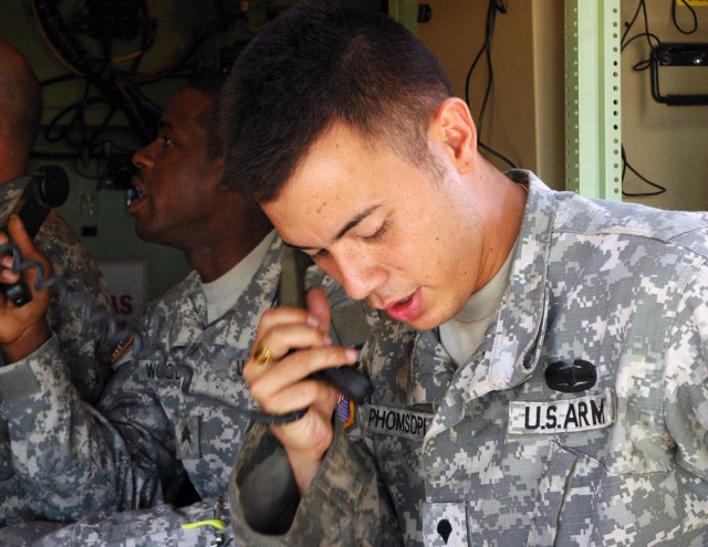 Sgt. Joseph Woodson (left), from Ohatchee, Ala., and Spc. Trinity Phomsopha (right), from Van Buren, Ariz., both fire direction specialists with Battery A, 2nd Battalion, 82nd Field Artillery Regiment, 3rd Brigade Combat Team, 1st Cavalry...